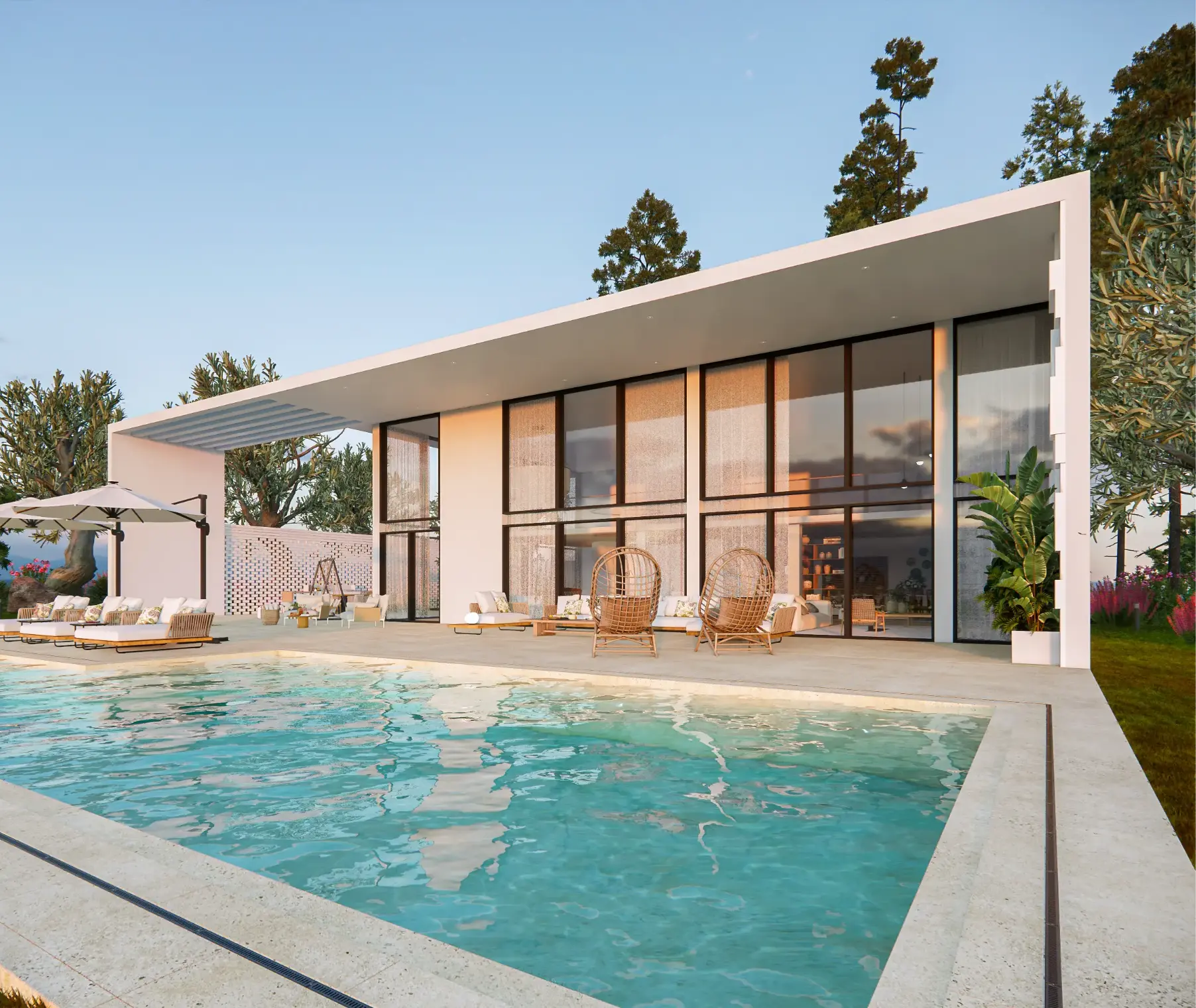 Fachada, zona da piscina e de estar exterior de imponente moradia situada na zona de Cascais.