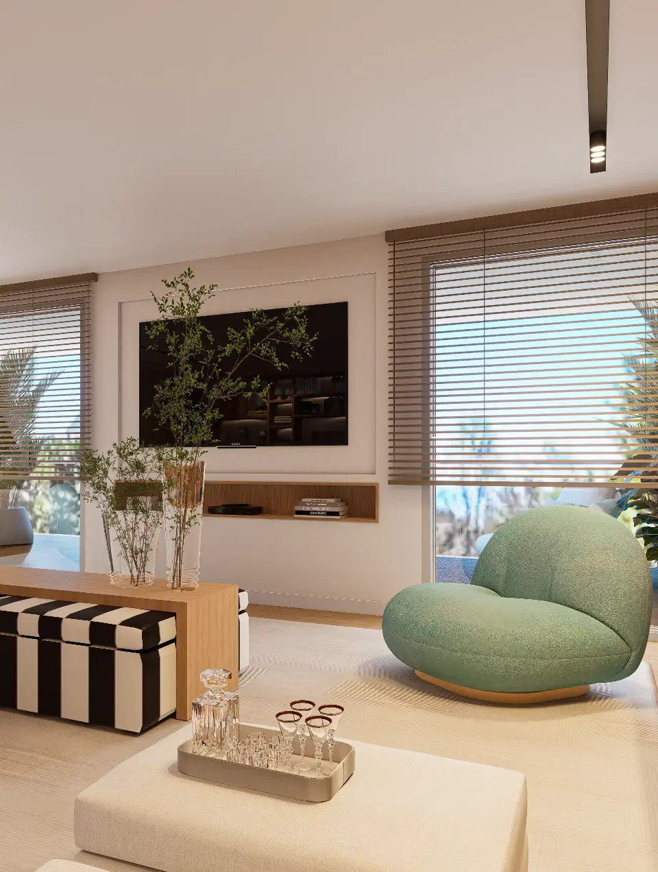 Decoração de apartamento em estilo contemporâneo com cadeirões verdesde linhas redondas na zona de TV