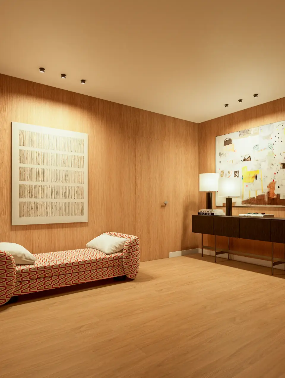 Hall de entrada apainelado a madeira com downlights salientes a iluminar os quadros nas paredes.