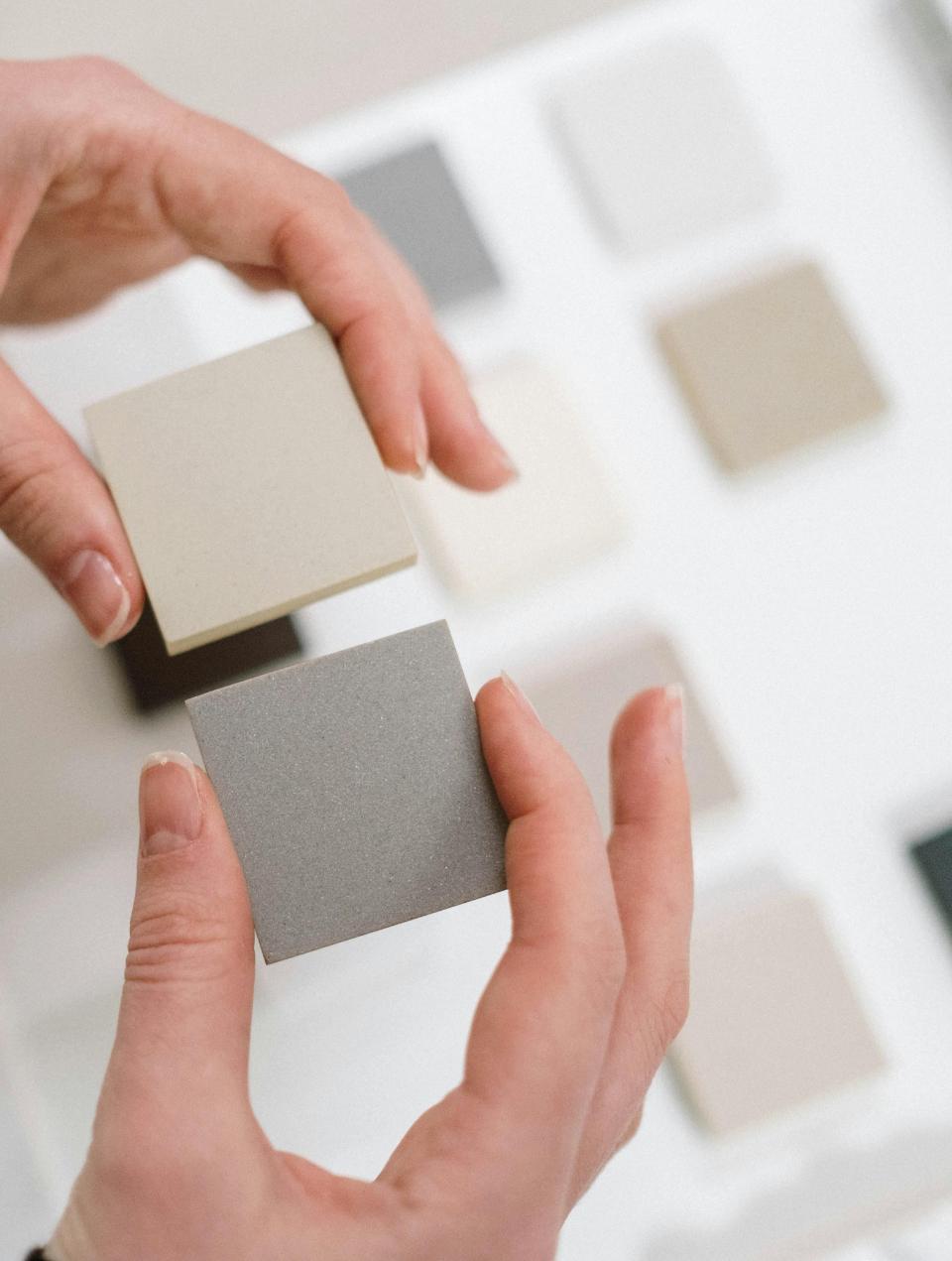 Selecting gray color samples for painting apartment walls
