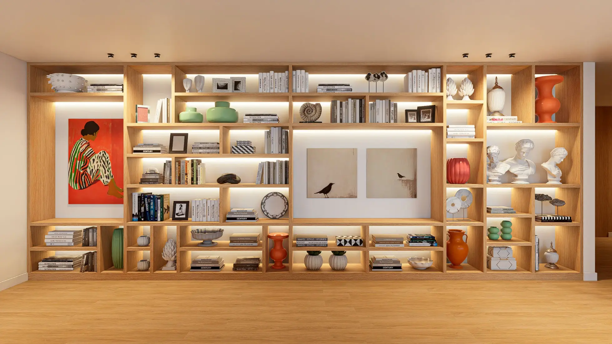 Custom-designed oak bookcase with white background that accommodates various pictures and decorative pieces