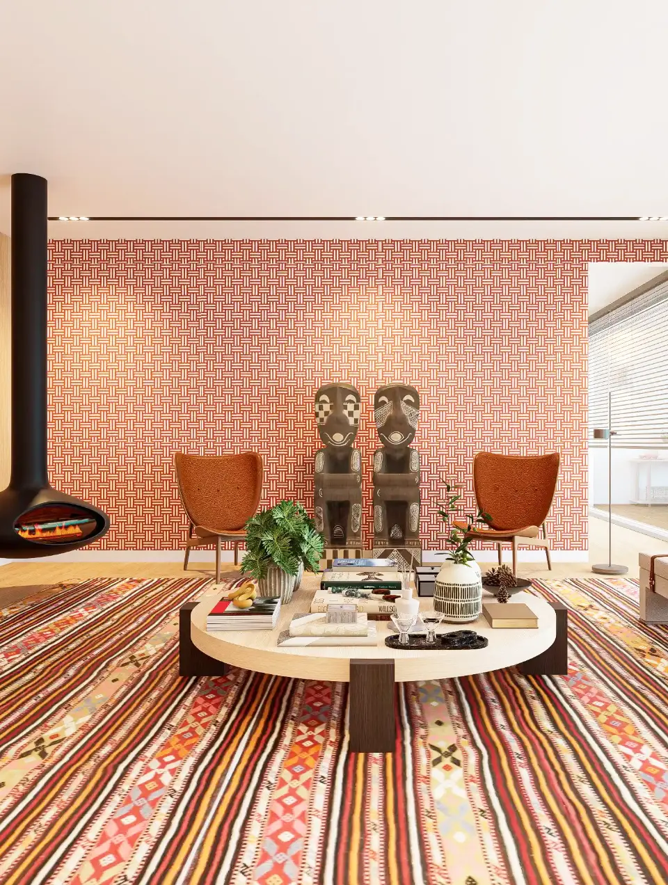 Large living room with white curved sofa, colorful rug with geometric patterns, round coffee table, black suspended fireplace, and bespoke bookcase
