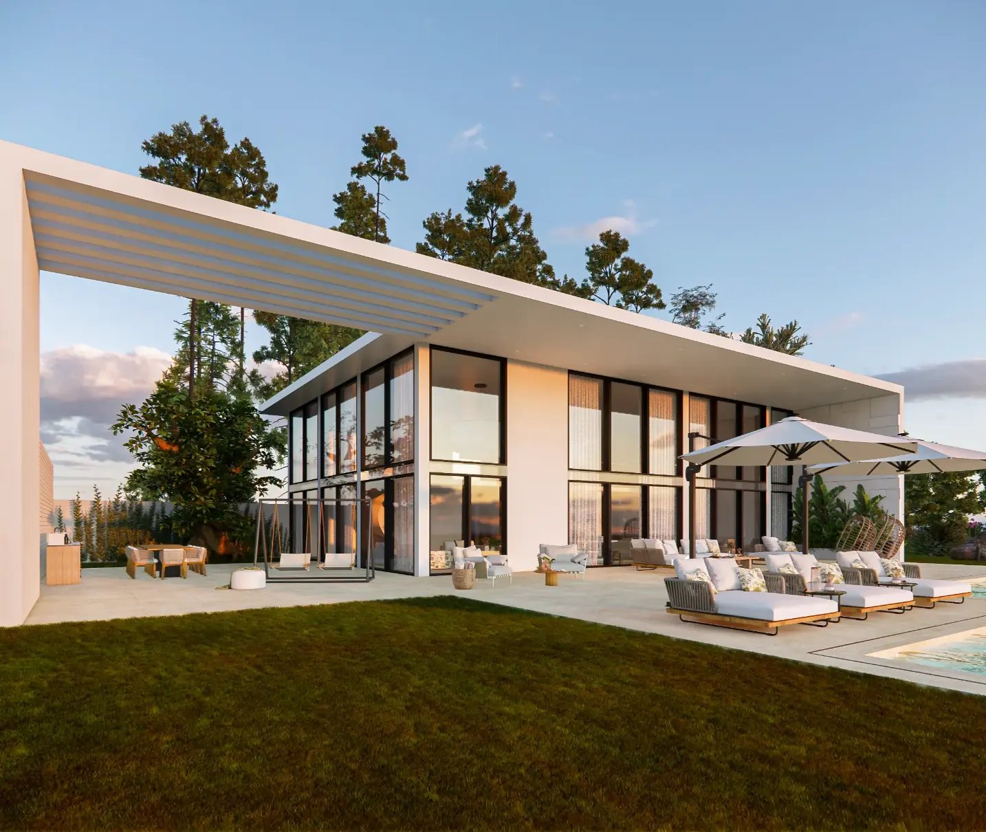 Perspetiva lateral de moradia contemporânea de luxo em Cascais com amplas janelas, piscina, espreguiçadeiras com guarda-sóis e área de lazer 