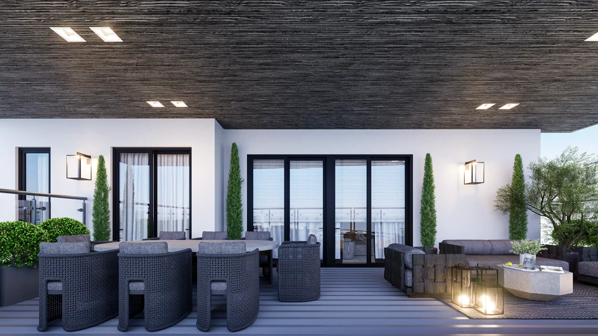 Decorção de terraço em estilo contemporâneo com mesa de jantar e cadeiras cinza, sofás e cadeirões cinza e vegetação